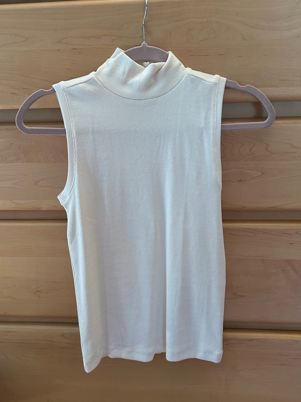 Sleeveless Cream Turtleneck Top